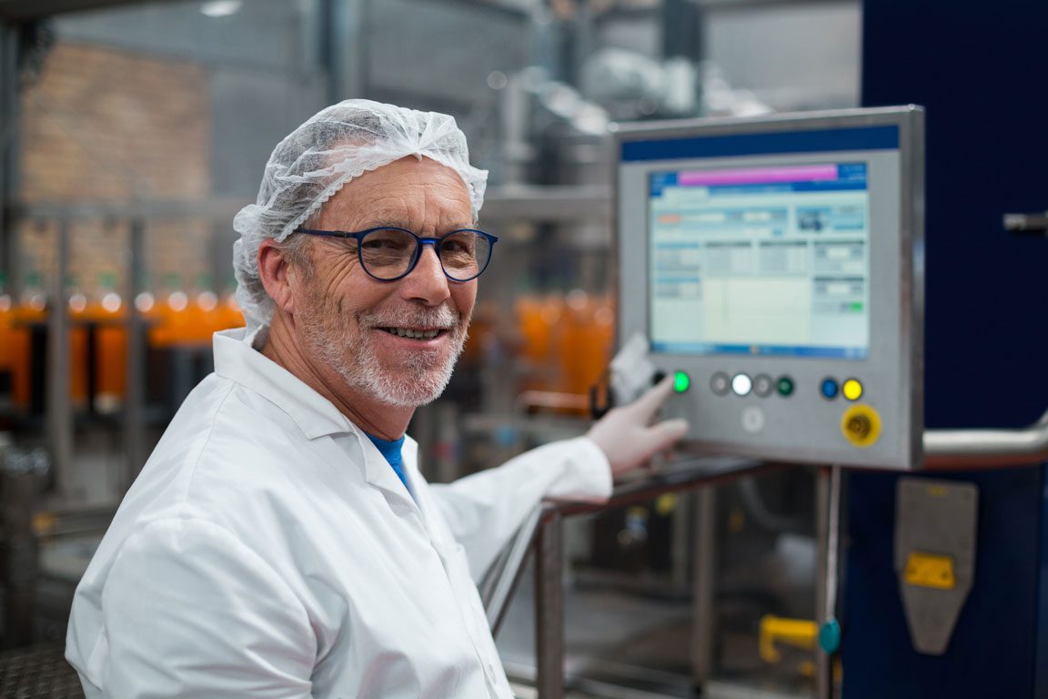 factory-engineer-operating-machine-in-factory manufacturing worker in factory