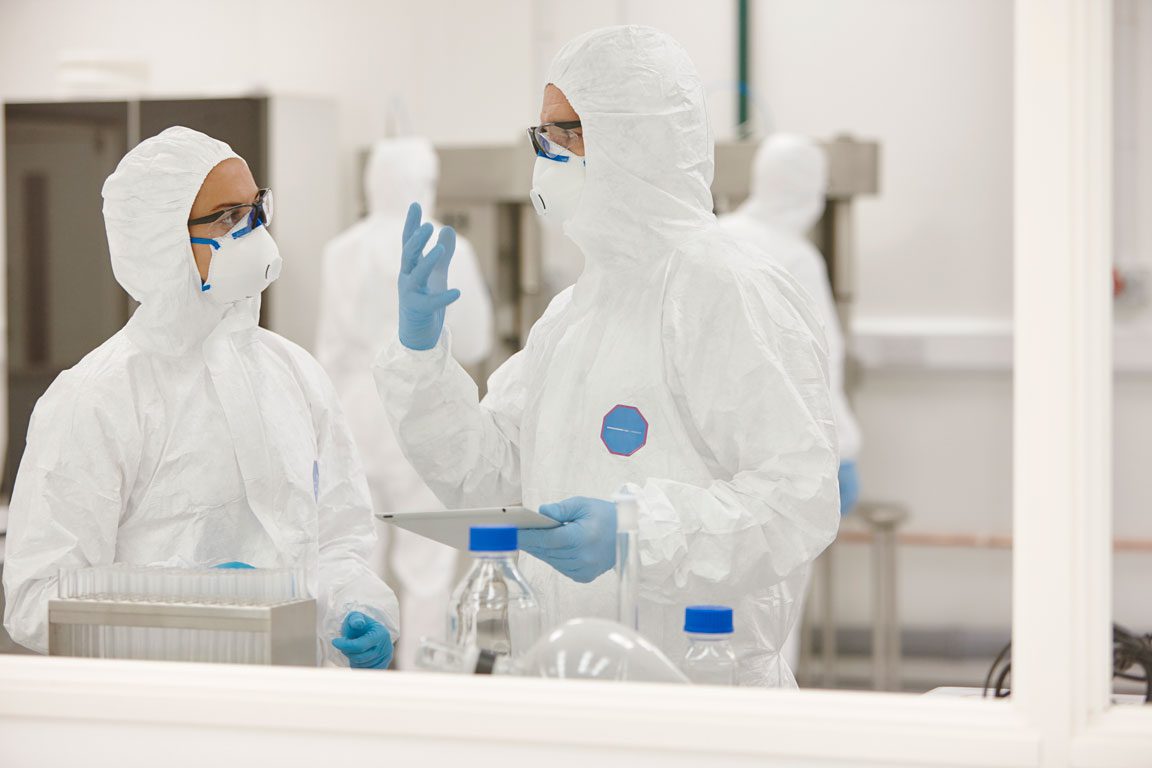 scientists-working-in-laboratory scientists in lab