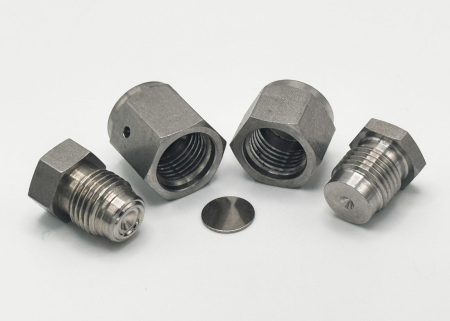 Caps and Plugs for Face Seal-Style Fittings